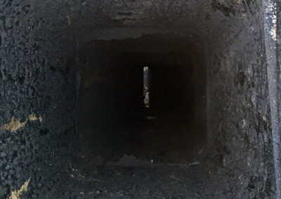 A view of the inside of an open air vent.