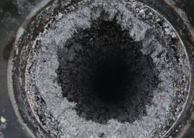 A close up of the bottom of a pipe